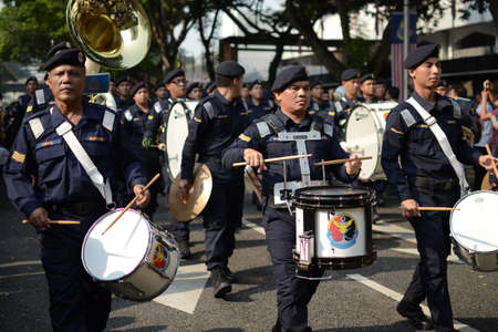 KUALA LUMPUR, MALAYSIA-31st August 2017; Celebrating Malaysia Independence Day at Dataran Merdeka. All the soldier, police marching in group, and the crowd enjoy the performance with raised the flagのeditorial素材