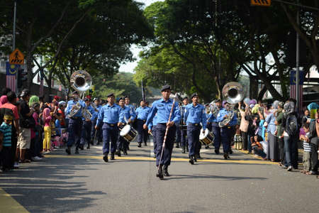 KUALA LUMPUR, MALAYSIA-31st August 2017; Celebrating Malaysia Independence Day at Dataran Merdeka. All the soldier, police marching in group, and the crowd enjoy the performance with raised the flagのeditorial素材