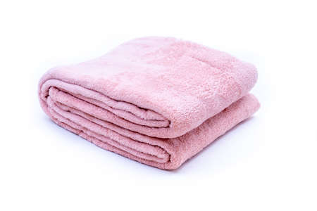 Folded red coral fleece throw isolated on white backgroundの写真素材