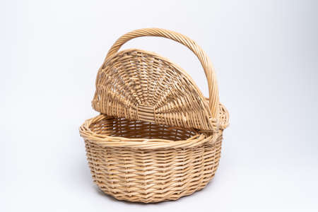Basket wicker on isolated white background.の写真素材