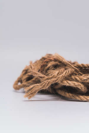 Natural garden jute twine string rope.Best Twine for Binding and Wrapping Materials. On a white background surfaceの写真素材