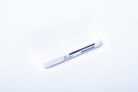 The white color of CM104 USB 3.0 to TF SD Simultaneous Read Memory Card Reader. Isolated on white backgroundの写真素材