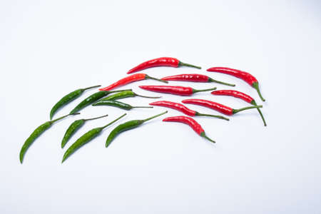 A group of green and red chili. Isolated on white backgroundの写真素材