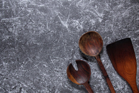 wooden cooking utensils. Concrete texture concept backgroundの写真素材
