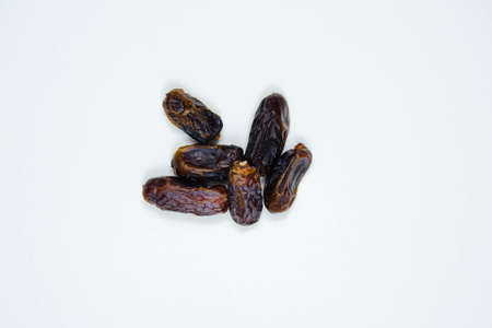 Dates or kurma on white background. Copy spaceの写真素材