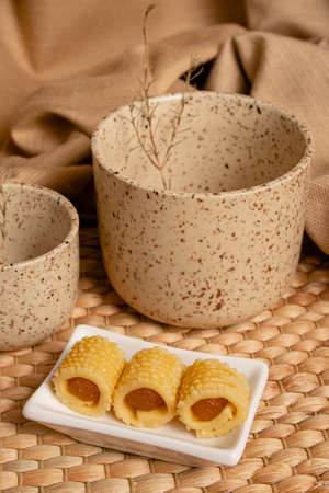 Delicious homemade pineapple roll tart for eid fitr on a with plateの写真素材