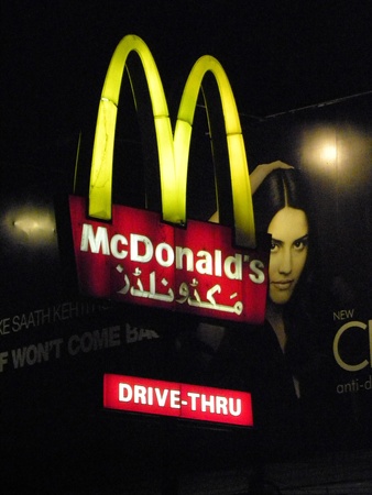 PAKISTAN/KARACHI_MCDONAL'S CORPORATION IS ONE OF THE MUST LARGEST CHAINS OF FAST FOOD RESTAURANTS IN THE WORLD THE YELLOW M WITH ITS' GOLDEN ARCHES' IS ONE OF THE MOST WELL KNOW COMMERCIAL SIGNS IS ALSO A AYMBOL FOR CUSTOMERS TODAY ON MONDAY 16 APRIL 2012のeditorial素材