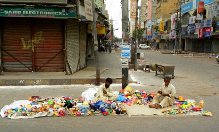 Karachi, Pakistan : Toy stall just got open in early morning    preparing to sell toys here on Monday 4 February 2013 in Karachi Saddar market                          のeditorial素材