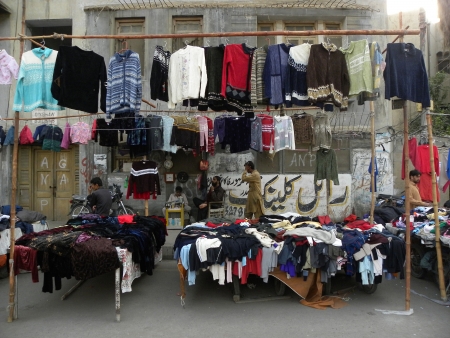KARACHI PAKISTAN_PEOPLE COME TOWARDS MARKETS TO BUY WARM CLOTHS BLANKETS IN CHEAP PRICES HERE ON MONDAY 25 NOVENBER 2013  SADDAR BAZAR KARACHI                        のeditorial素材