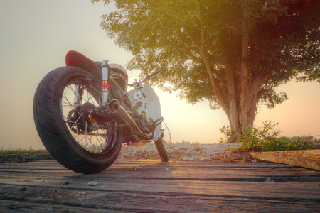 Honda C70 custom back view with paddy field view backgroundのeditorial素材