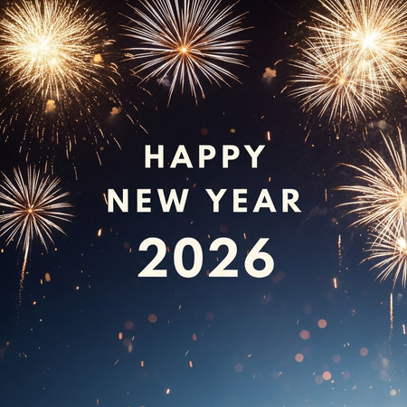 Happy new year 2016 written with Sparkle firework on blue sky backgroundの素材