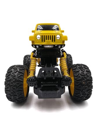 A yellow Monster truck toy isolated on white backgroundの写真素材