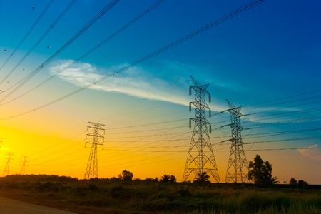 Electricity pylons at sunset