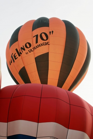 PUTRAJAYA, MALAYSIA - MARCH 30 : Hot air ballon flies at the 5th Putrajaya International Hot Air Balloon Fiesta on March 30, 2013 in Putrajaya, Malaysia.のeditorial素材