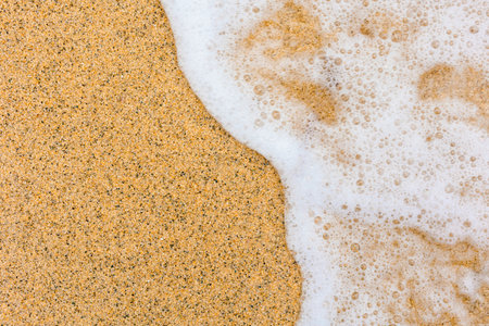 Soft wave of the sea on the sandy beach
