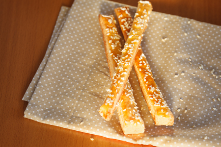 Bread sticks  with cheese and sesame on  the napkin.の写真素材