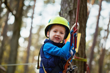 Happy little boy having fun outdoor, playing and doing activities. Happy Childhood conceptの写真素材