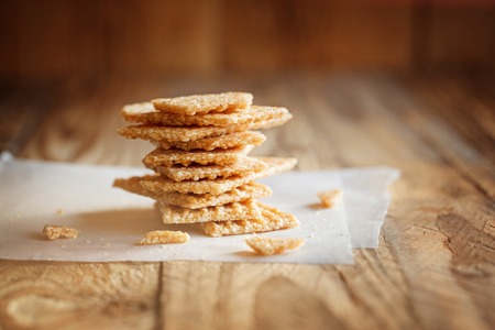 Chopped Candied  White Sesame  in Stack on Wooden Backgroundの写真素材