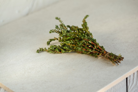Wild fresh Thyme Herb on white background.