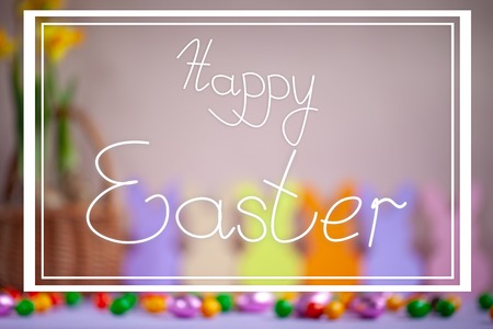 Blured holiday easter background with text Happy Easterの写真素材