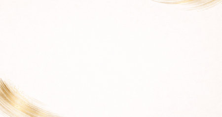 Blank white paper with golden paint brush stroke texture for copy spaceの写真素材