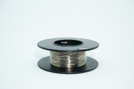 Kanthal coil for vaping device isolated on white backgroundの写真素材