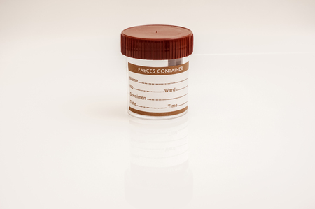 faeces container isolated with white backgroundの写真素材