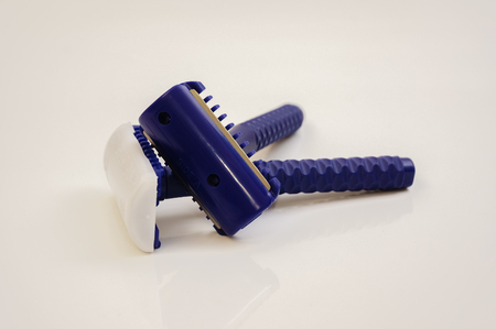 blue shaver isolated with white backgroundの写真素材