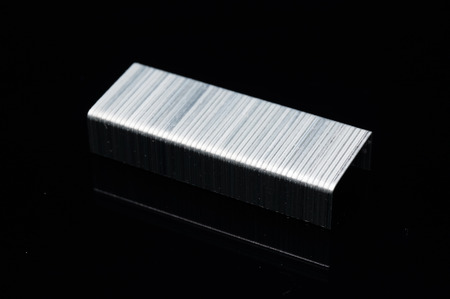 stapler bullets isolated on blackの写真素材