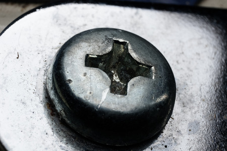 close up of metal screw head