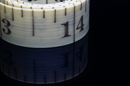 measuring tape isolated on black