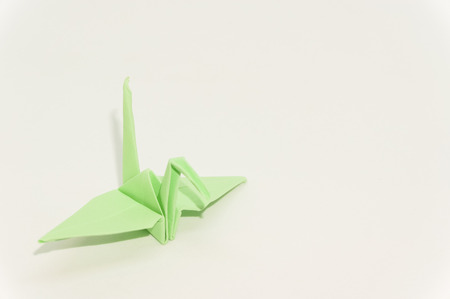 origami crane isolated on whiteの写真素材