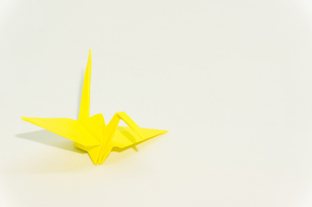origami crane isolated on whiteの写真素材