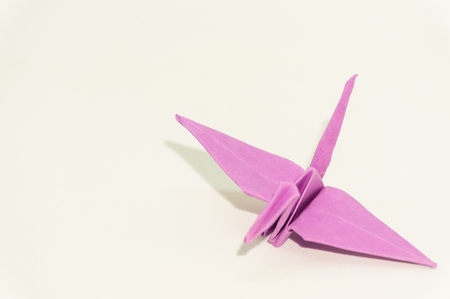 origami crane isolated on whiteの写真素材