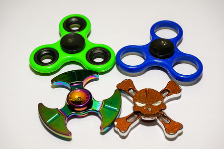 fidget finger spinner isolated on whiteの写真素材