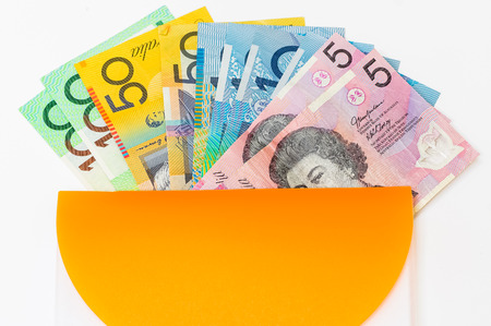 closeup shot of australian dollar on whiteの写真素材