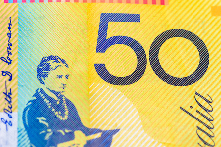 closeup shot of australian dollar on whiteの写真素材