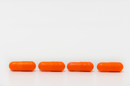 colorful of a capsule isolated on whiteの写真素材