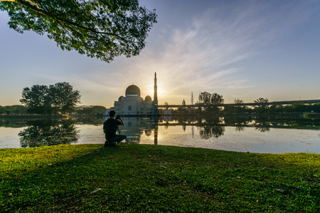beatiful scene of islamic mosque with reflectionの写真素材