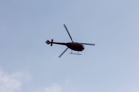 view of a helicopter flies over the skyの写真素材
