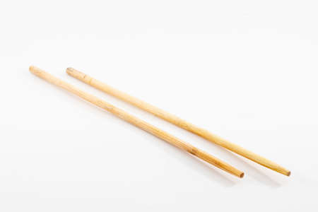 closeup shot of a chopsticks isolated on white backgroundの写真素材
