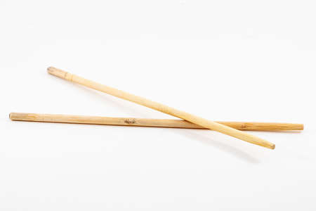 closeup shot of a chopsticks isolated on white backgroundの写真素材