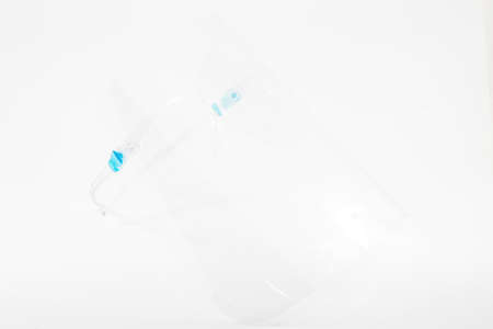closeup shot of a face shield isolated on whiteの写真素材