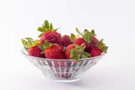 closeup shot of a strawberries isolated on white backgroundの写真素材