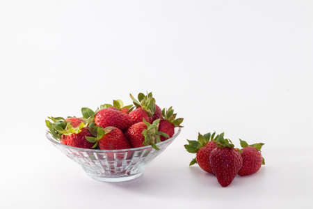 closeup shot of a strawberries isolated on white backgroundの写真素材
