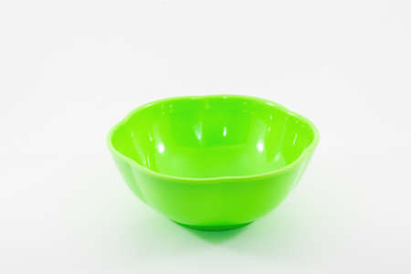closeup shot of a empty bowl isolated on white backgroundの写真素材