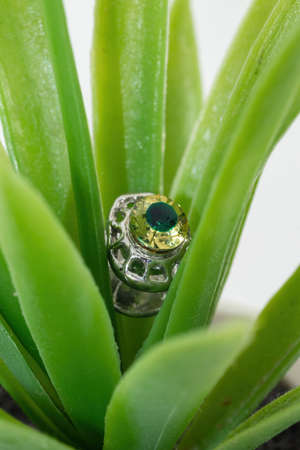 closeup shot of a malay costume button isolated on white backgroundの写真素材