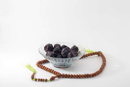 closeup shot of a dates isolated on white background.conceptual image of islamic cultureの写真素材