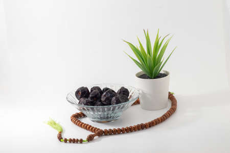 closeup shot of a dates isolated on white background.conceptual image of islamic cultureの写真素材