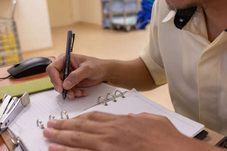 closeup shot of men work at the office